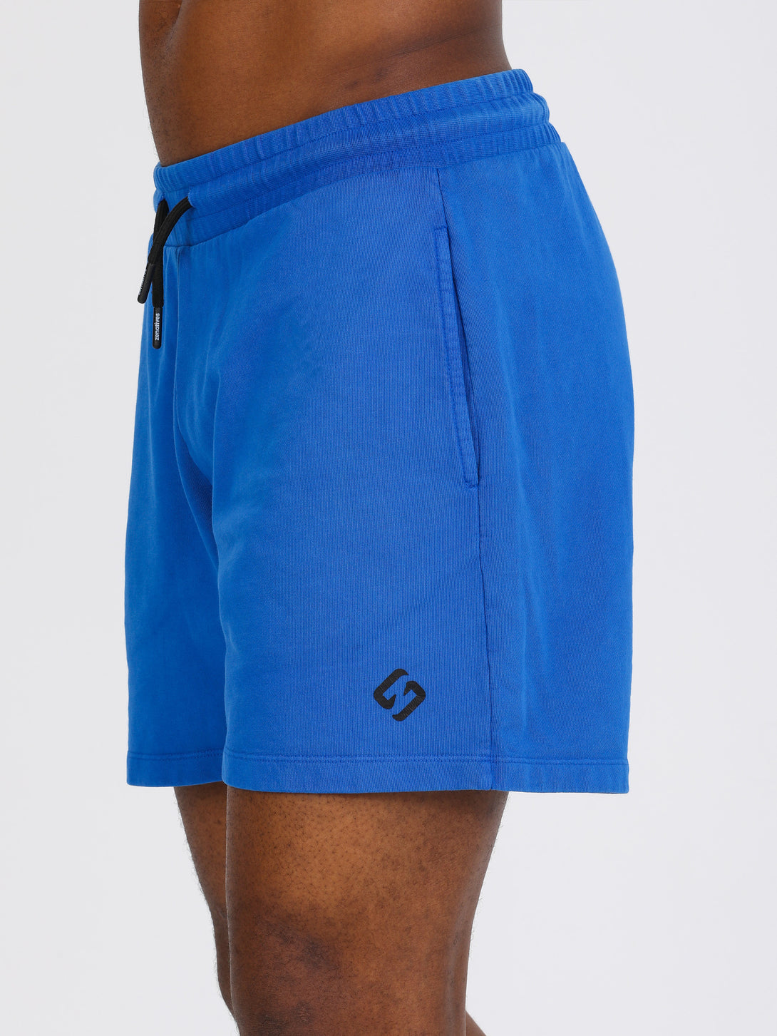 A Man Wearing Lapis Blue Color Essential Mens Workout Shorts