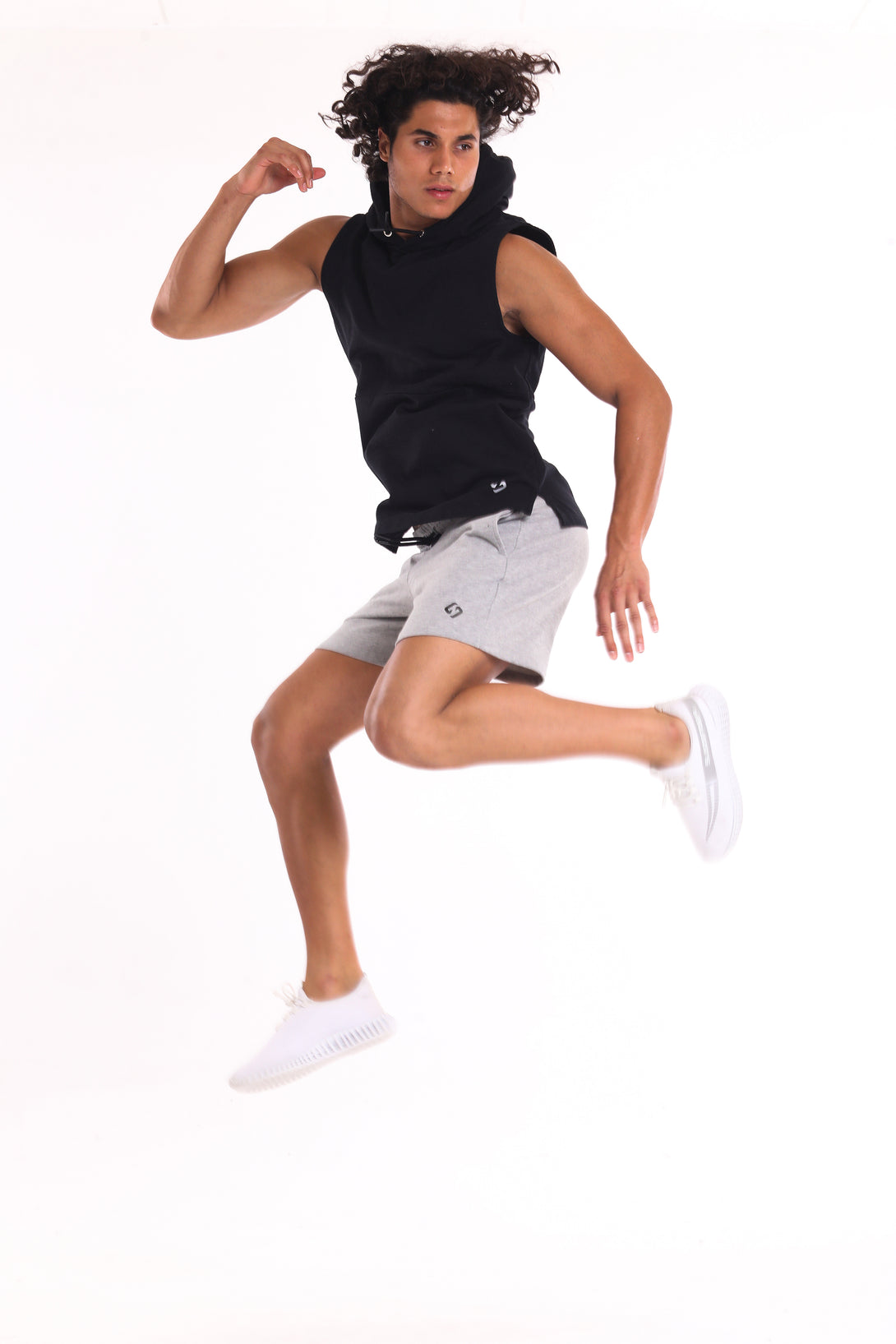 A Man Wearing Light Grey Melange Color Essential Mens Workout Shorts