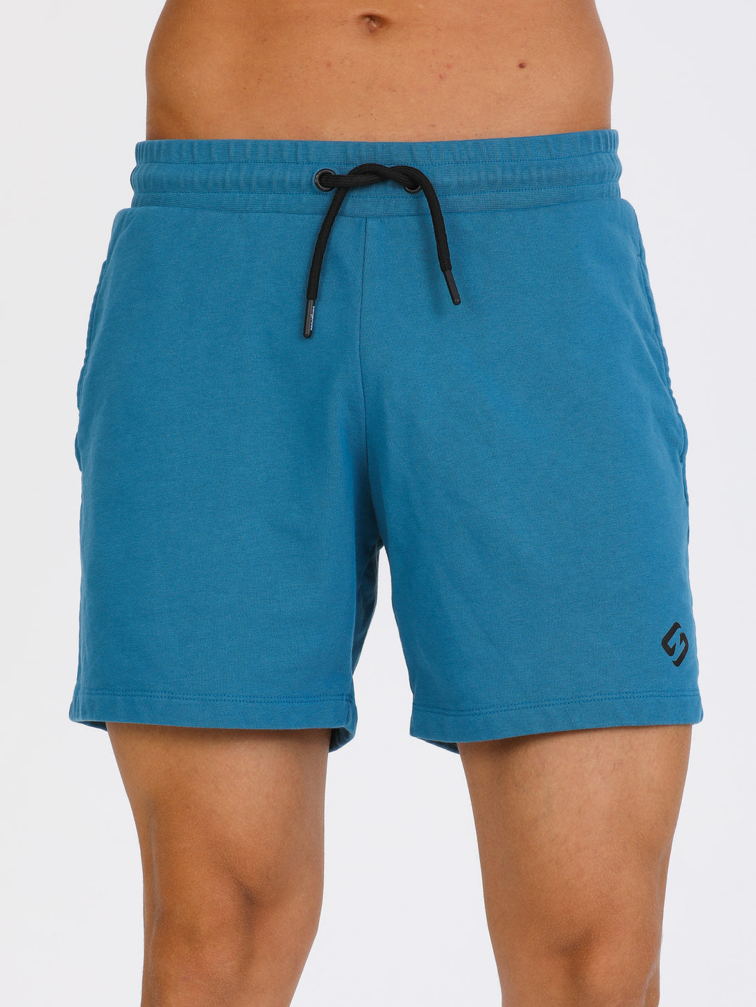 A Man Wearing Saxony Blue Color Essential Mens Workout Shorts