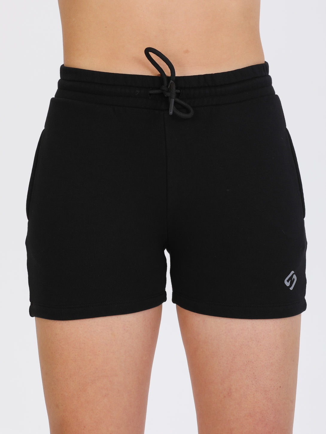 A Woman Wearing Black Color Essential Womens Workout Shorts