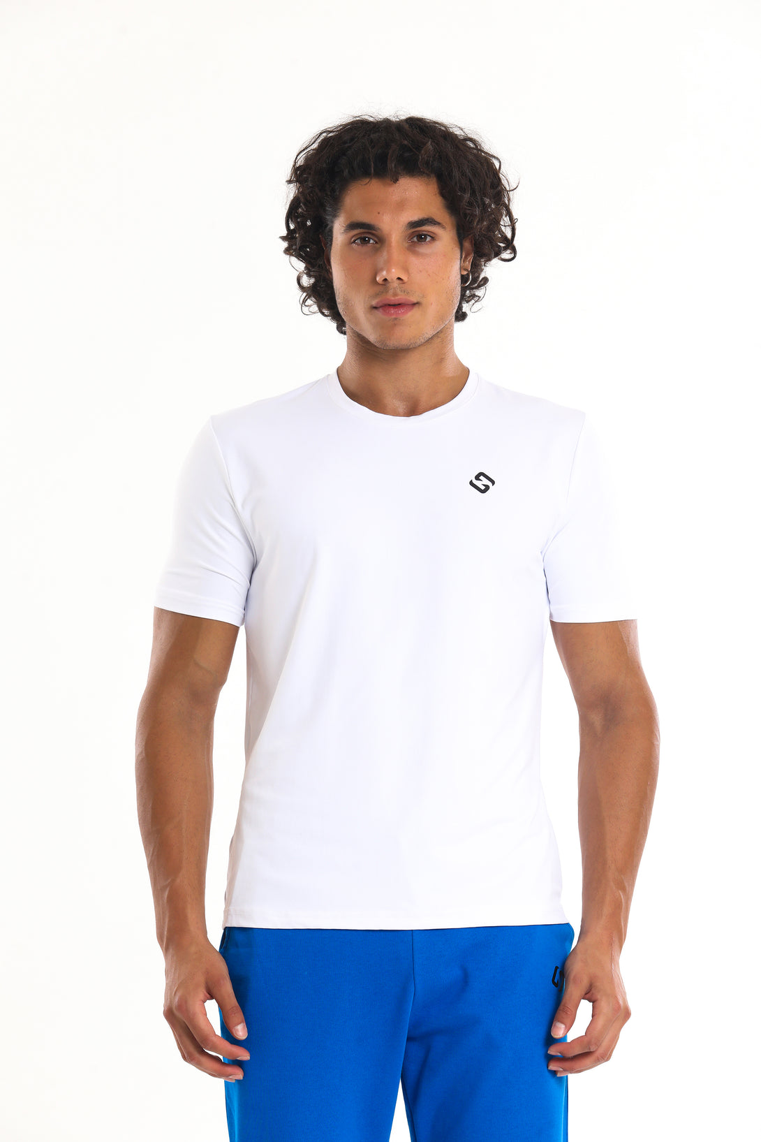 A Man Wearing White Color Essential Workout T-Shirt