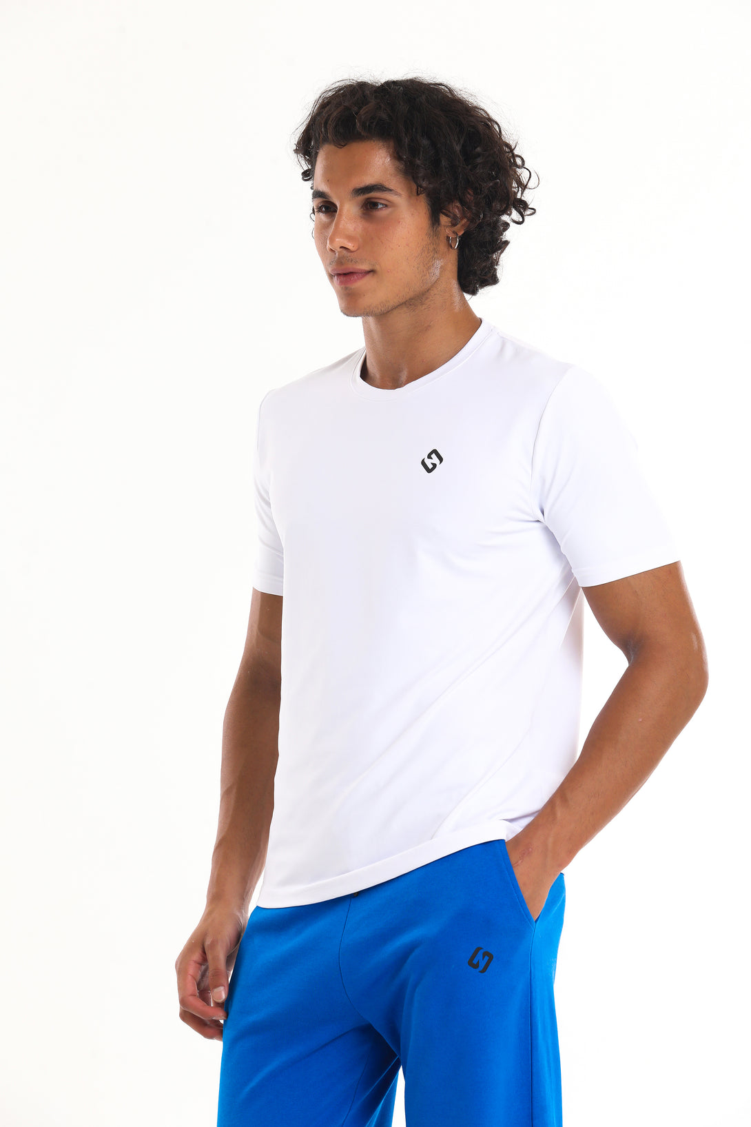 A Man Wearing White Color Essential Workout T-Shirt