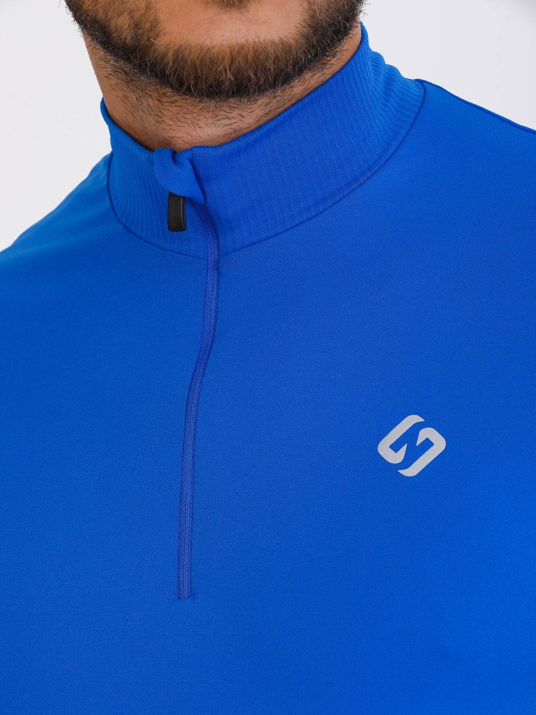 A Man Wearing Lapis Blue Color Seamless Short Sleeve Zipped T-Shirt