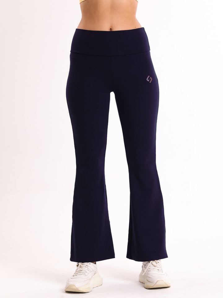 A Woman Wearing Peacoat Color Legacy Jersey Yoga Pants