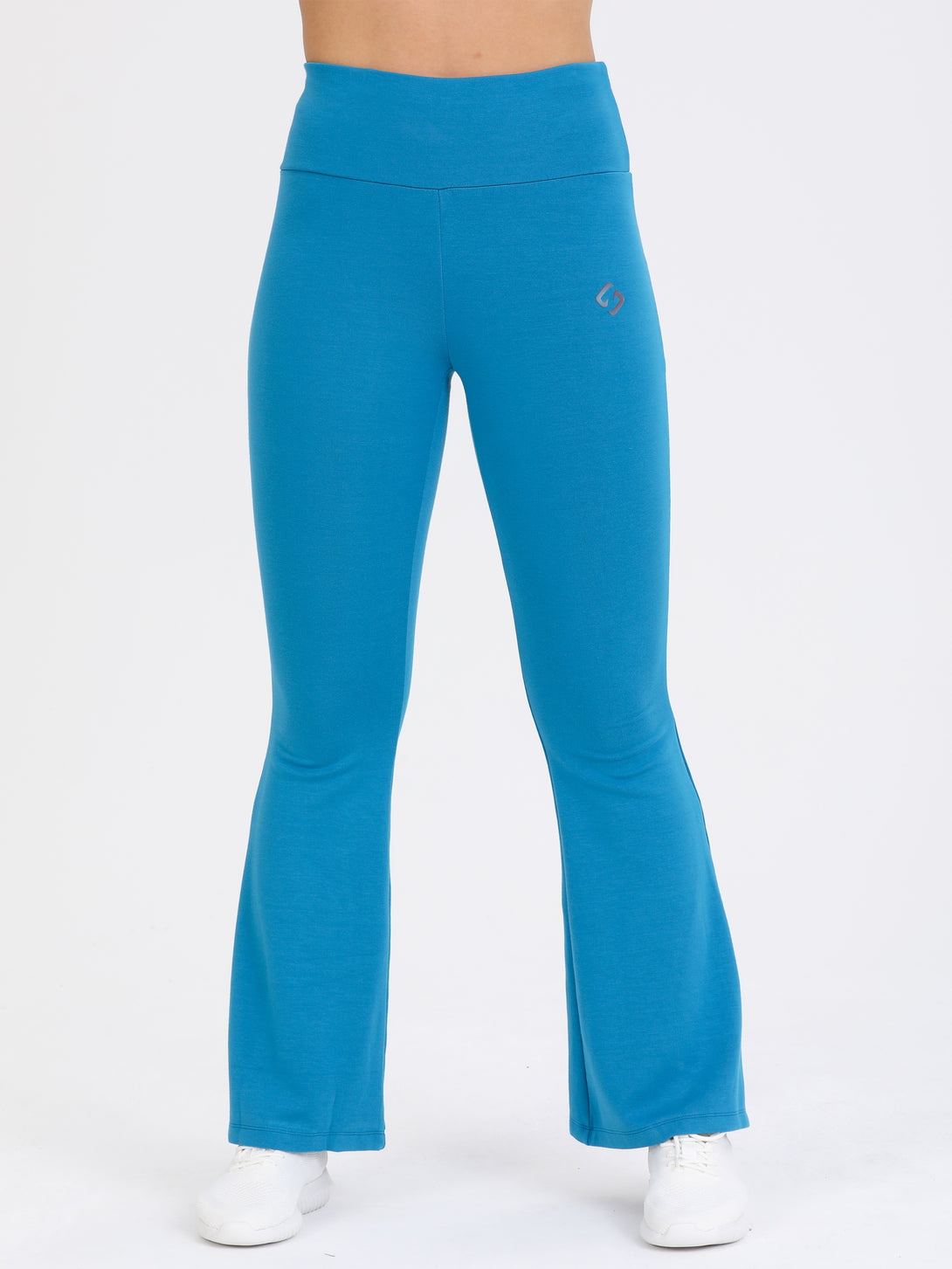 A Woman Wearing Saxony Blue Color Legacy Jersey Yoga Pants
