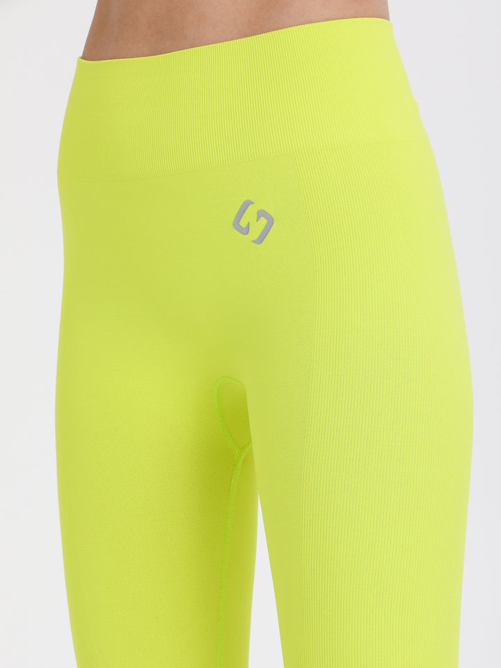 A Woman Wearing Lime Color Seamless Full-Length Legging
