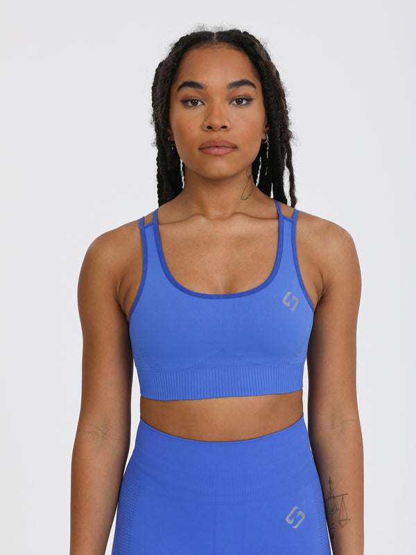 Color_Amparo Blue | A Woman Wearing Amparo Blue Color Seamless Light Support Sports Bra