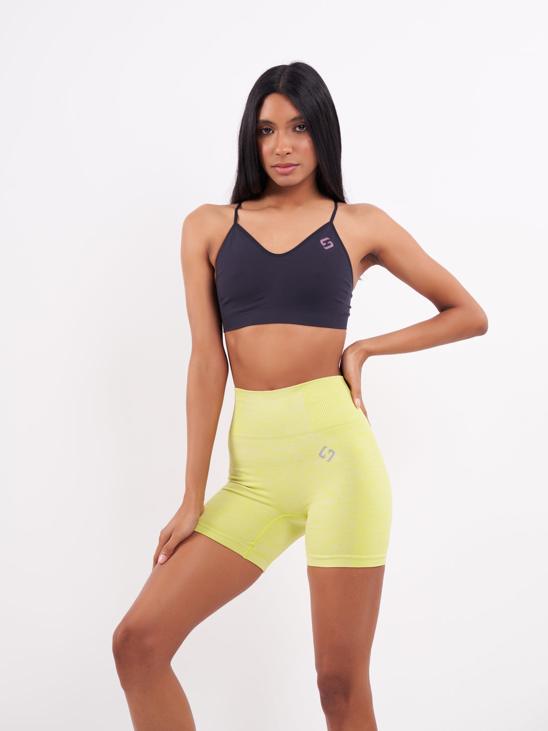A Woman Wearing Lime Color Seamless Melange Shorts