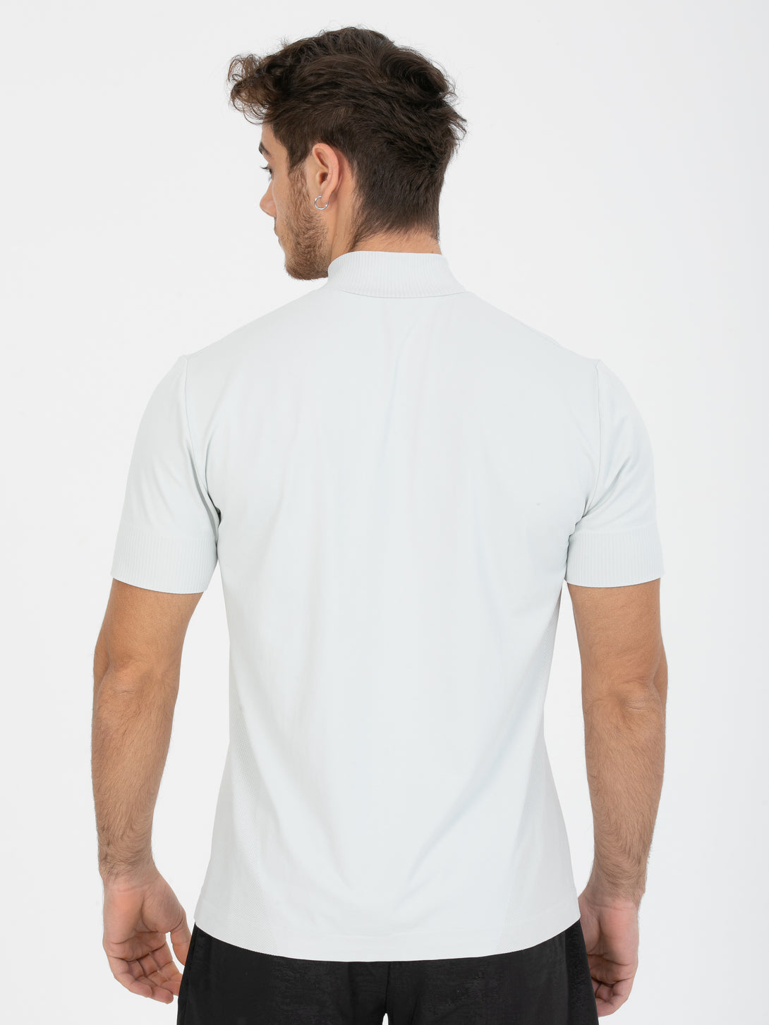 A Man Wearing Light Grey Color Seamless Short Sleeve Zipped T-Shirt