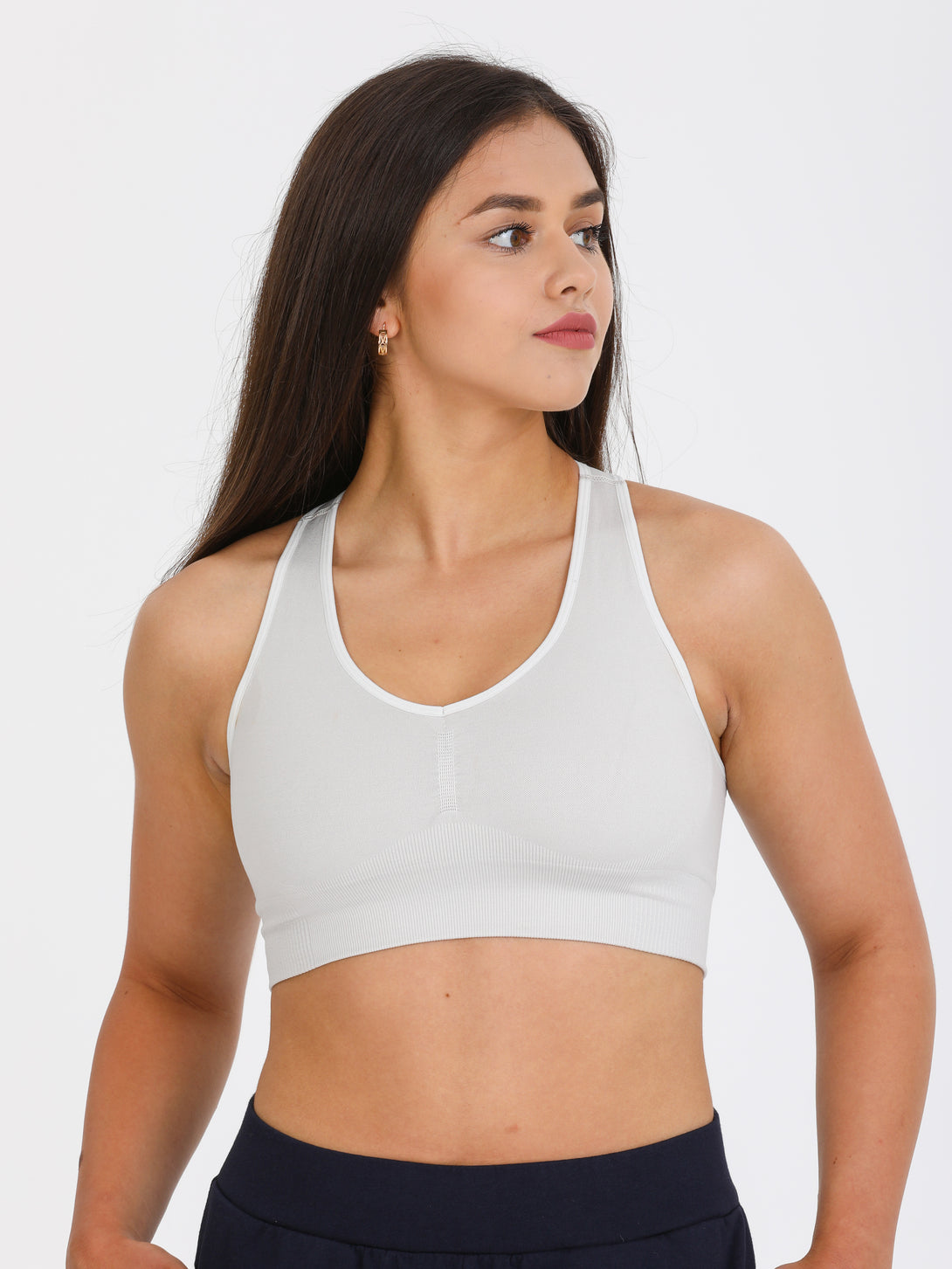 A Woman Wearing Light Grey Color Single Back Strap Medium-Support Sports Bra