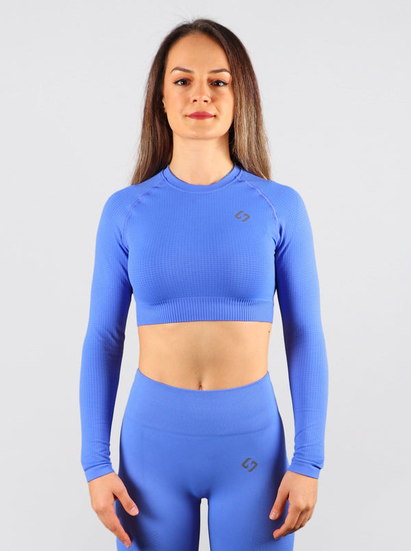 Color_Sapphire | A Woman Wearing Sapphire Color The Main Long Sleeve Crop Top
