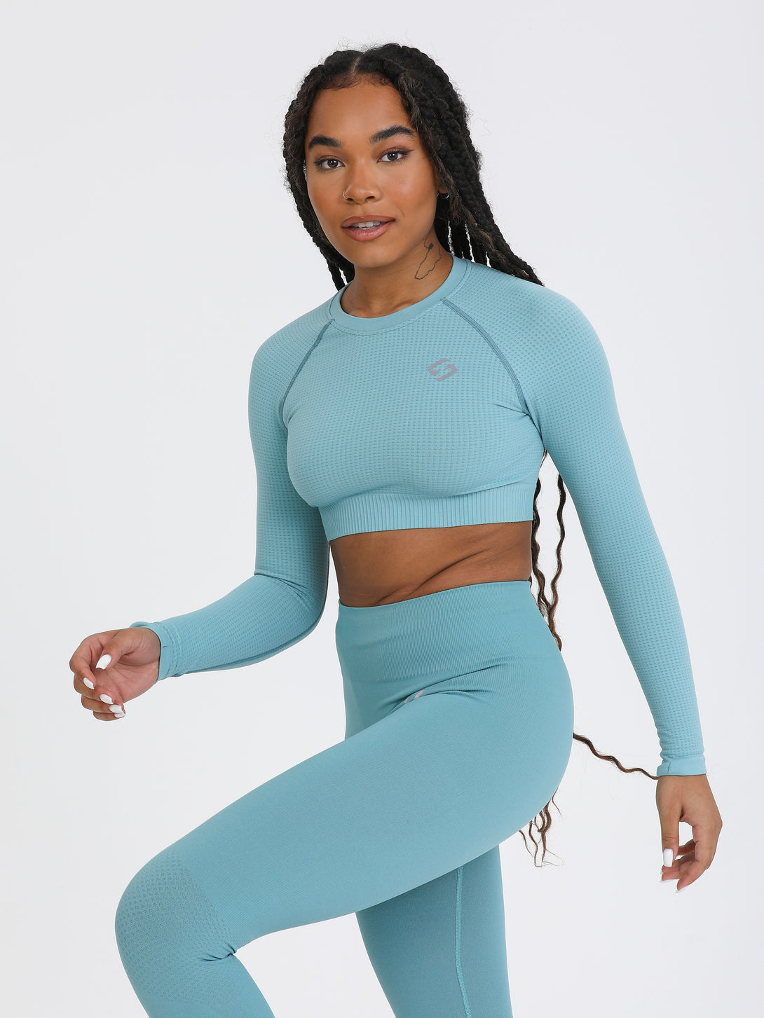 A Woman Wearing Arctic Color The Main Long Sleeve Crop Top