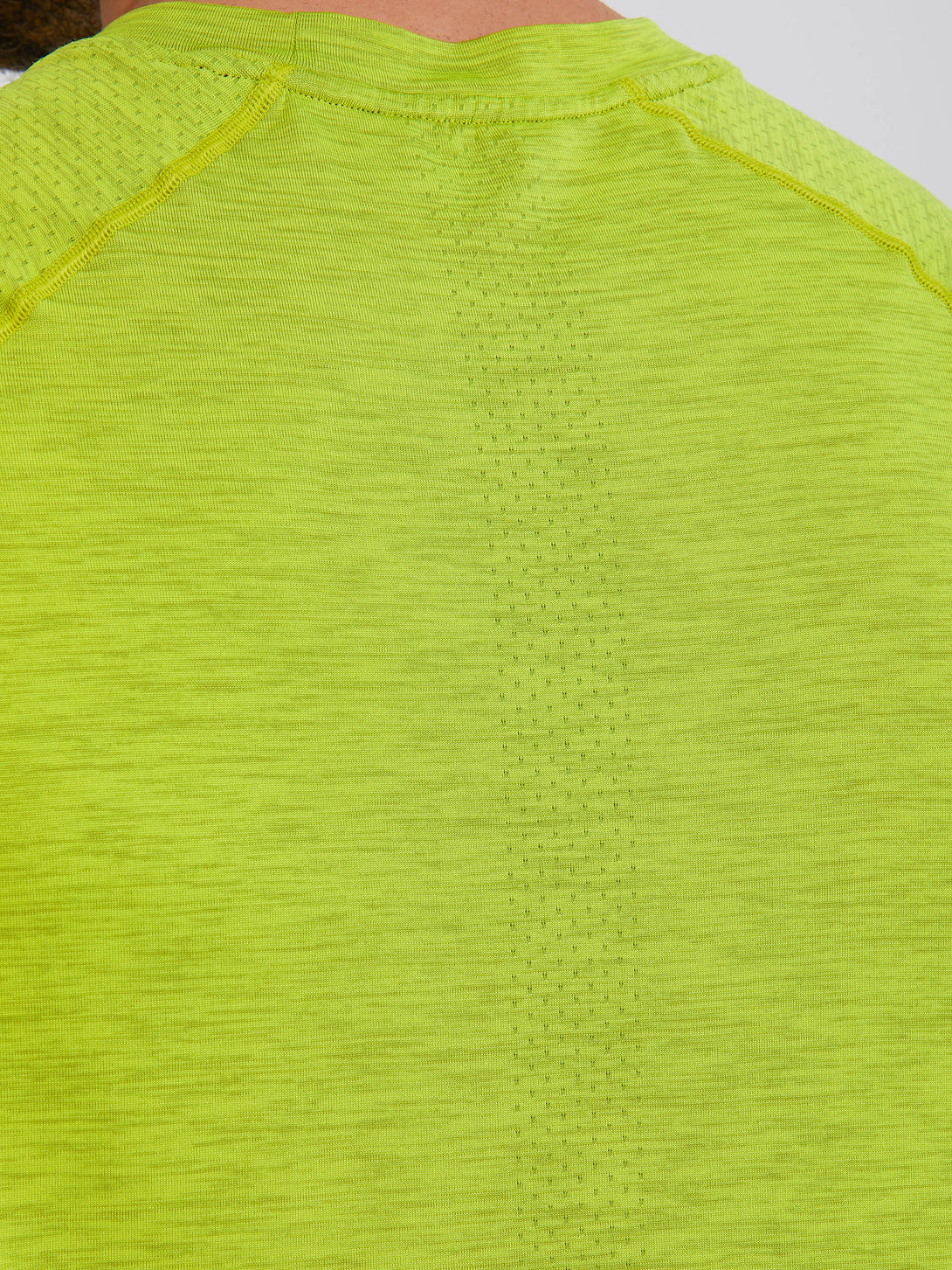 A Man Wearing Lime Color Seamless Workout Comfort T-Shirt