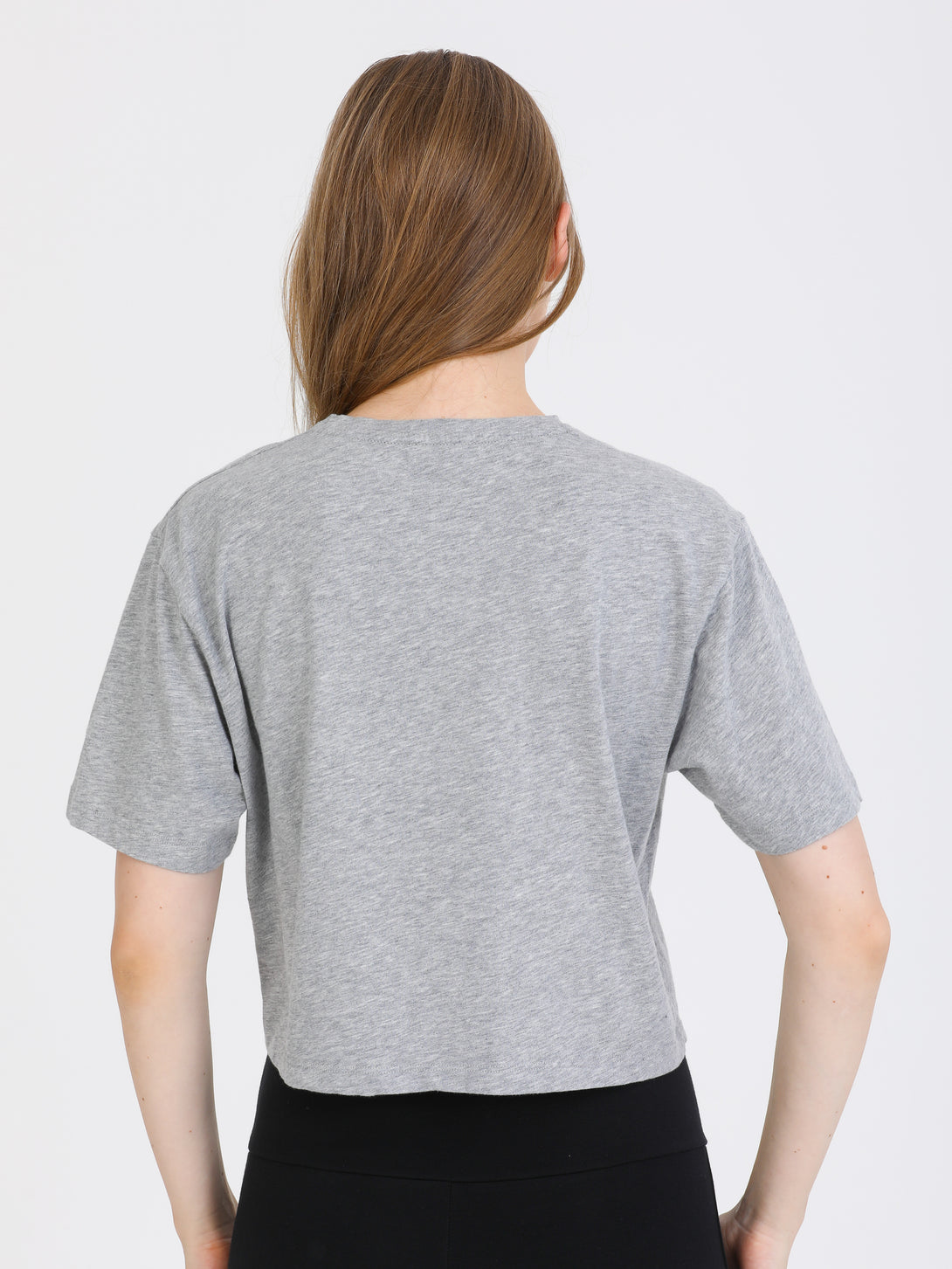 A Woman Wearing Light Grey Melange Color Zen And Chill Crop Tee