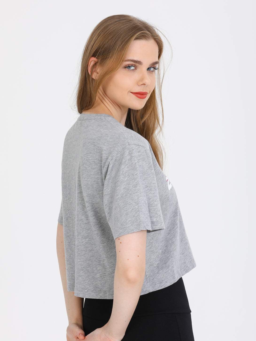 A Woman Wearing Light Grey Melange Color Zen And Chill Crop Tee